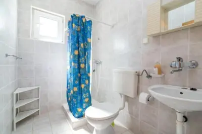 Kupaonica u objektu Apartments Boguvila - Two-Bedroom Standard Apartment with Terrace A6 - ST