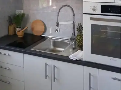 Kuhinja ili čajna kuhinja u objektu Apartments Natasa- One Bedroom Apartment with Balcony A1 - ST