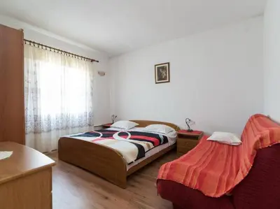 Krevet ili kreveti u jedinici u objektu Apartment Alana - Two Bedroom Apartment with Terrace and Sea View - ST