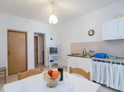 Kuhinja ili čajna kuhinja u objektu Apartments Boguvila - Two-Bedroom Basic Apartment with Terrace A1 - ST