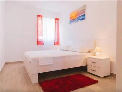 Krevet ili kreveti u jedinici u objektu Apartment with balcony and sea view