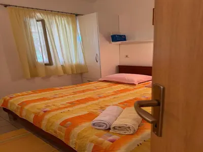 Krevet ili kreveti u jedinici u objektu Apartments Magdalena - Bungalow with terrace A1