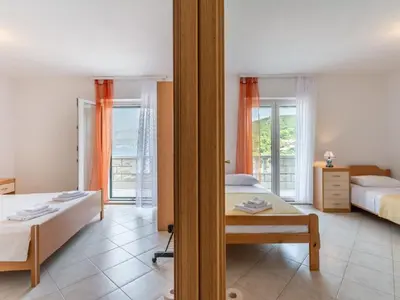 Krevet ili kreveti u jedinici u objektu Apartments Darija - One Bedroom Apartment ST