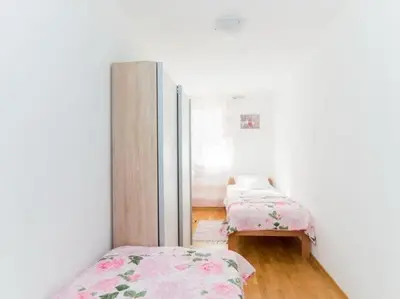 Krevet ili kreveti u jedinici u objektu Apartment Budimir - Two Bedroom Apartment with Balcony