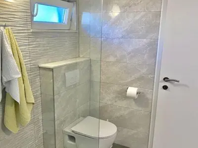 Kupaonica u objektu Holiday Home Oliva - Holiday House with Terrace and Sea View