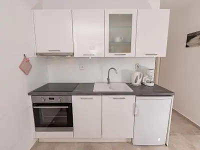 Kuhinja ili čajna kuhinja u objektu Apartments Magdalena - Apartment with Sea View and Terrace A3