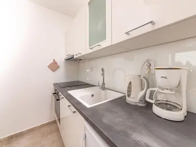 Kuhinja ili čajna kuhinja u objektu Apartments Magdalena - Apartment with Sea View and Terrace A3