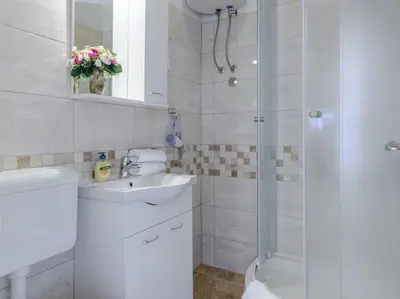 Kupaonica u objektu Rooms Sani- Double Room with Terrace and Sea View S2