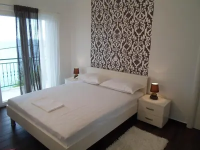 Krevet ili kreveti u jedinici u objektu House Karlo Apartments - One-Bedroom Apartment with Two Balconies and Sea View A5