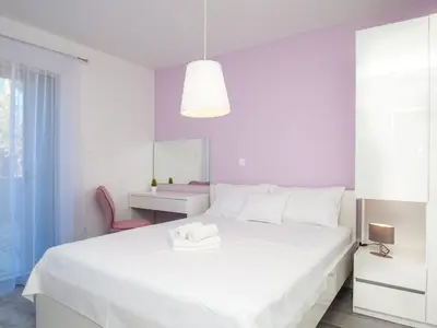 Krevet ili kreveti u jedinici u objektu Apartments Dva Galeba - One Bedroom Apartment with Terrace 102