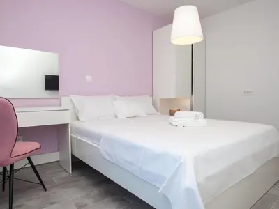 Krevet ili kreveti u jedinici u objektu Apartments Dva Galeba - One Bedroom Apartment with Terrace 102