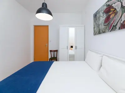 Krevet ili kreveti u jedinici u objektu Apartments Marti - Four Bedroom Apartment with Terrace and Sea View - ST