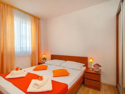 Krevet ili kreveti u jedinici u objektu Apartments Island Beat - One Bedroom Apartment with Balcony and Sea View A7 ST