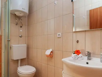 Kupaonica u objektu Apartments Island Beat - One Bedroom Apartment with Balcony and Sea View A7 ST