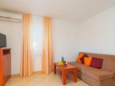 TV i/ili zabavni centar u objektu Apartments Island Beat - Two Bedroom Apartment with Balcony A6 ST