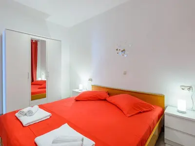 Krevet ili kreveti u jedinici u objektu Apartments Hope Dugi Rat - Comfort OneBedroom Apartment with Terrace and Sea View A1