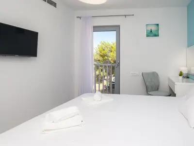 Krevet ili kreveti u jedinici u objektu Apartments Dva Galeba - One Bedroom Apartment with Sea View 204