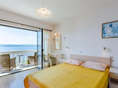 Krevet ili kreveti u jedinici u objektu Villa Kosa - Studio Apartment with Balcony and Sea View