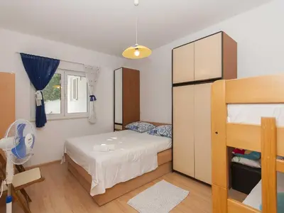 Krevet ili kreveti u jedinici u objektu Apartment Brajki-Three Bedroom Apartment with Balcony and Sea View