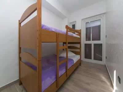 Krevet ili kreveti na kat u jedinici u objektu Apartment Papilio - Two Bedroom Apartment with Terrace