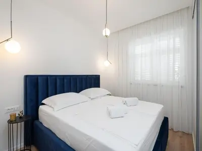 Krevet ili kreveti u jedinici u objektu Apartment Tomas with balcony and sea view