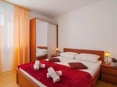 Krevet ili kreveti u jedinici u objektu Apartments Island Beat - Two Bedroom Apartment with Balcony A9 prizemlje ST