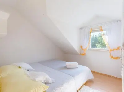 Krevet ili kreveti u jedinici u objektu Villa Stella - Two Bedroom Apartment with Balcony and Sea View Marilena