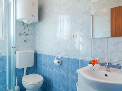 Kupaonica u objektu Apartments Island Beat - One Bedroom Apartment with Balcony and Sea View A1 ST