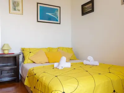 Krevet ili kreveti u jedinici u objektu Apartments Sunrise Duilovo -Three Bedroom Apartment with Sea View Terrace