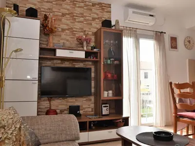 TV i/ili zabavni centar u objektu Apartment Manigo - Three bedroom apartment