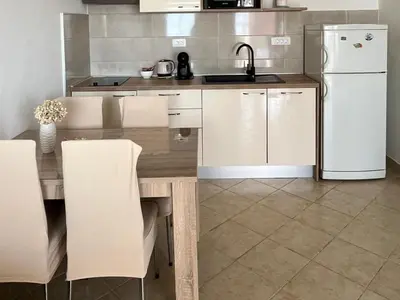 Kuhinja ili čajna kuhinja u objektu Apartments Dobrila - One Bedroom Apartment with Terrace - A1