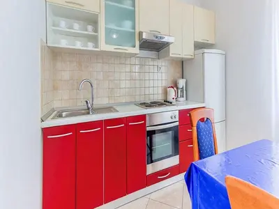 Kuhinja ili čajna kuhinja u objektu Apartments Ivo - Three bedroom apartment with terrace and sea view A1
