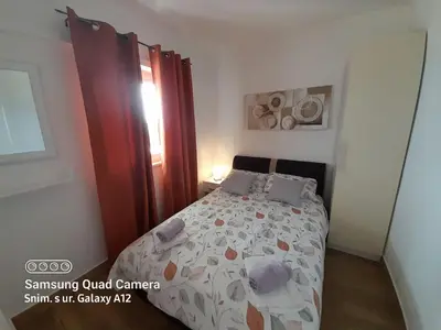 Krevet ili kreveti u jedinici u objektu Apartments Dobrila - Two Bedroom Apartment with Terrace - A2