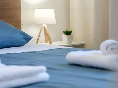 Krevet ili kreveti u jedinici u objektu Sunset view apartment - One bedroom apartment with balcony and sea view