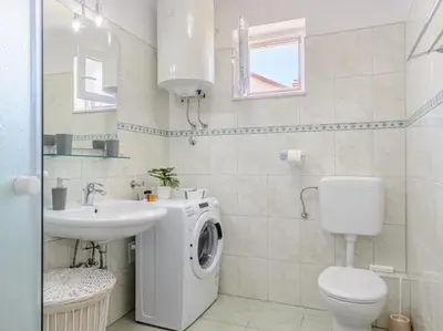 Kupaonica u objektu Sunset view apartment - One bedroom apartment with balcony and sea view