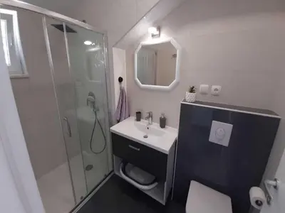 Kupaonica u objektu Apartments Dobrila - One Bedroom Apartment with Terrace and sea view - B1