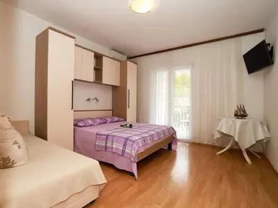Krevet ili kreveti u jedinici u objektu Apartments Pezo - Two Bedroom Apartment with Balcony