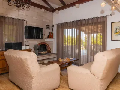 TV i/ili zabavni centar u objektu 4 bedroom villa with swimming pool