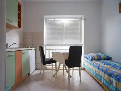 Krevet ili kreveti u jedinici u objektu Apartments Pezo - One Bedroom Apartment