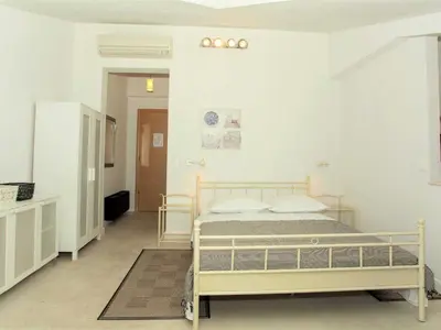 Krevet ili kreveti u jedinici u objektu Apartments & Room Vesna - Studio Apartment with Terrace and Sea View