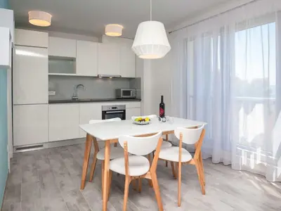 Kuhinja ili čajna kuhinja u objektu Apartments Dva Galeba - Premium One Bedroom Apartment with Sea View 103