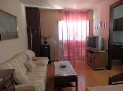 TV i/ili zabavni centar u objektu Apartment Vesna & Ivica - Two Bedroom Apartment with Terrace and Sea View Vesna