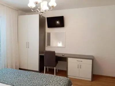 TV i/ili zabavni centar u objektu Apartments Pezo - Premium Studio with Balcony and Sea View