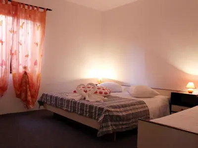 Krevet ili kreveti u jedinici u objektu Apartments Sweet Life - One-Bedroom Apartment with Terrace Nina ST