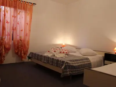 Krevet ili kreveti u jedinici u objektu Apartments Sweet Life - One-Bedroom Apartment with Terrace Nina ST