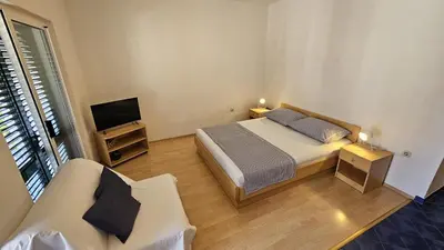 Krevet ili kreveti u jedinici u objektu Apartmani Makarska 1