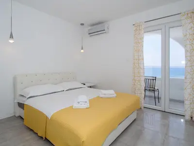 Krevet ili kreveti u jedinici u objektu Villa Tamaris on the beach