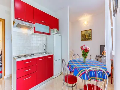 Kuhinja ili čajna kuhinja u objektu Apartments Ivo - Comfort One bedroom apartment with terrace and sea view A3