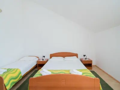 Krevet ili kreveti u jedinici u objektu Apartments Ana & Bogdan - One Bedroom Apartment with Terrace and Sea View A1 ST