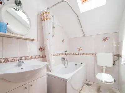 Kupaonica u objektu Apartments Ana & Bogdan - One Bedroom Apartment with Terrace and Sea View A1 ST
